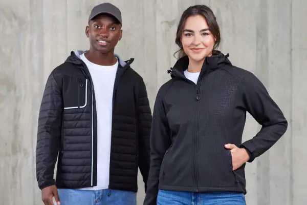 image of two people in warm winter jackets puffer and softshell to show jackets category