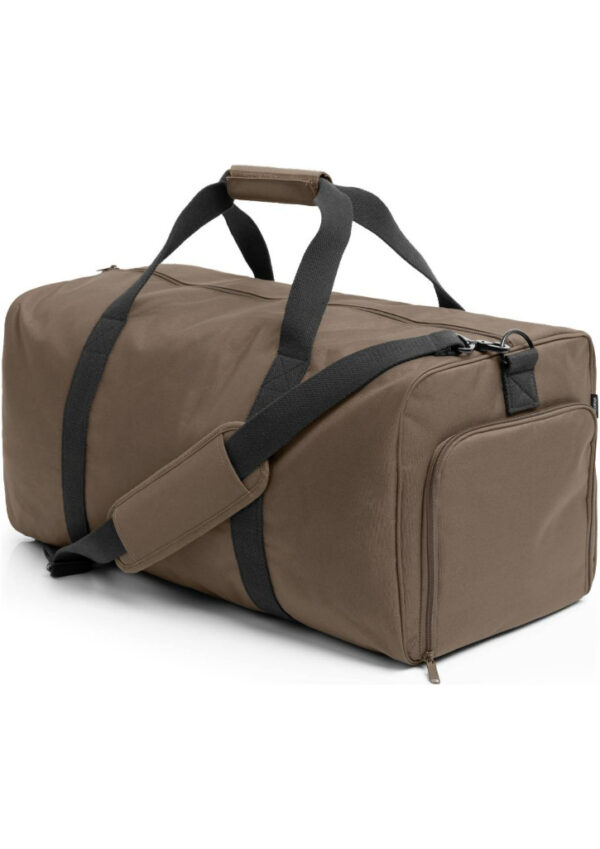 Brown duffel bag with black straps and handles, lying on its side and ready for travel.