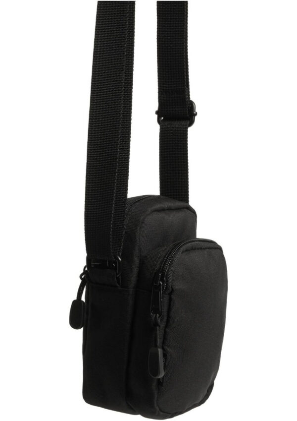 Black small crossbody bag with two zip compartments and an adjustable shoulder strap.
