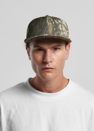 Front-facing portrait of a man wearing a camouflage baseball cap and a white T-shirt.