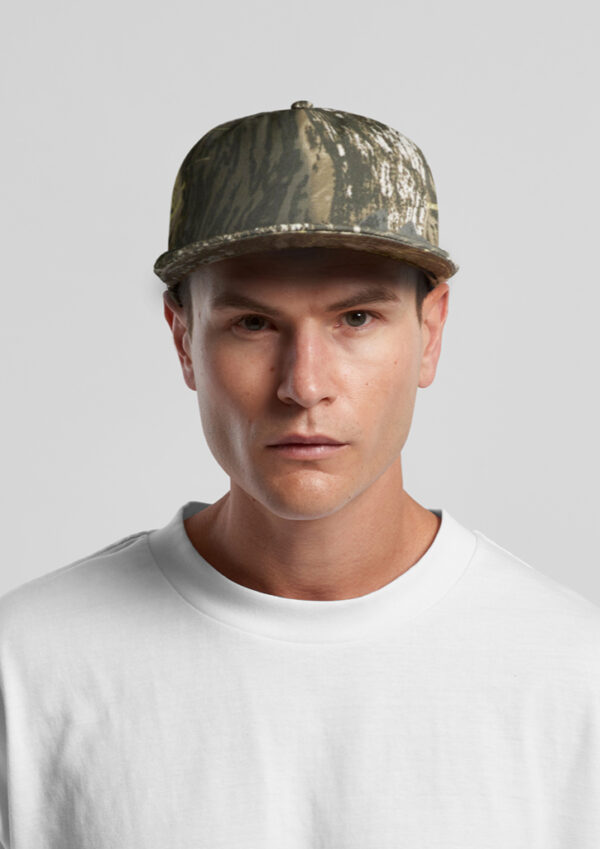 Front-facing portrait of a man wearing a camouflage baseball cap and a white T-shirt.