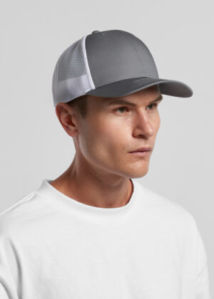 Man wearing a gray trucker cap with white mesh back, facing slightly right, against a plain light background.