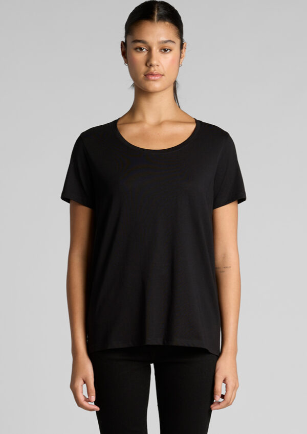 Woman wearing a plain black short-sleeve crew-neck t-shirt against a gray backdrop.