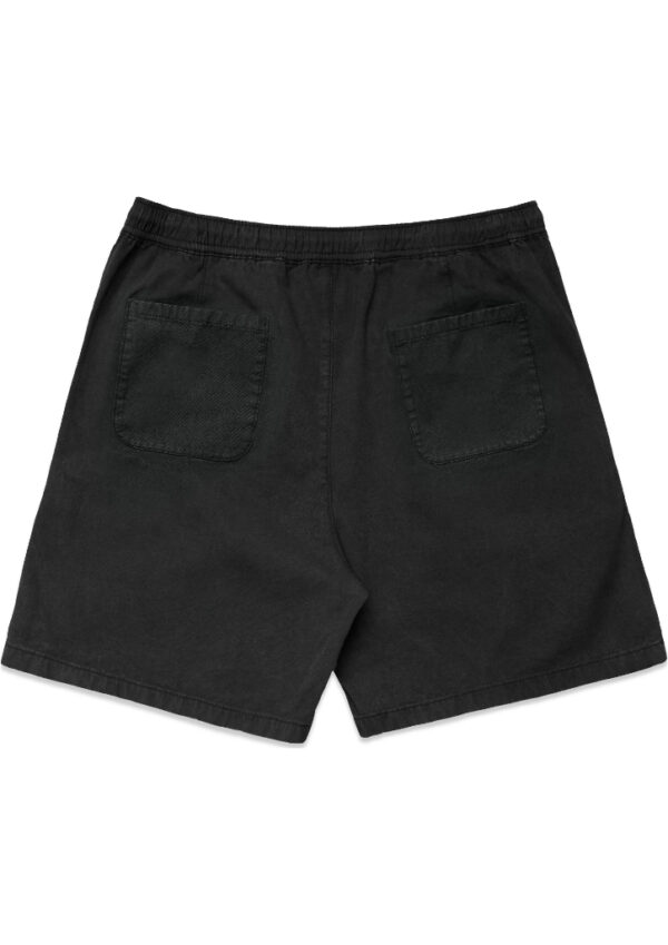 Back view of black shorts with two patch pockets and an elastic waistband.