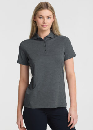 Woman modeling a dark heather gray short-sleeve polo shirt with a three-button placket and collar, fit relaxed against a light background.