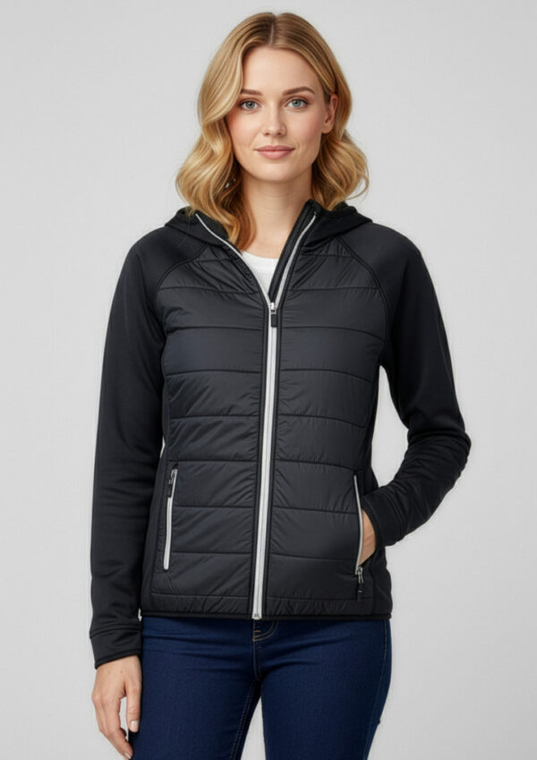 fbj515l_worn_00 Model wearing a two-tone quilted hooded jacket with a front zipper and zip pockets.