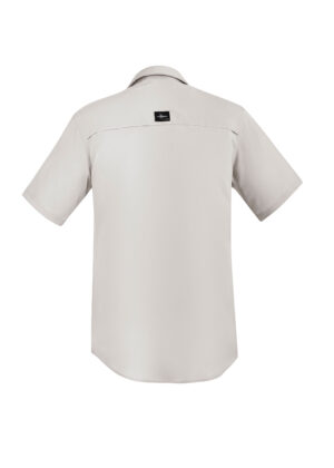 Back view of a light beige short-sleeve shirt, collared, with a small black brand label on the upper back.